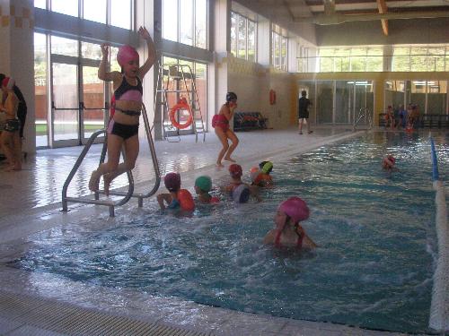 En la piscina